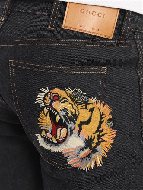 gucci jeans con tigre|gucci tiger accessories.